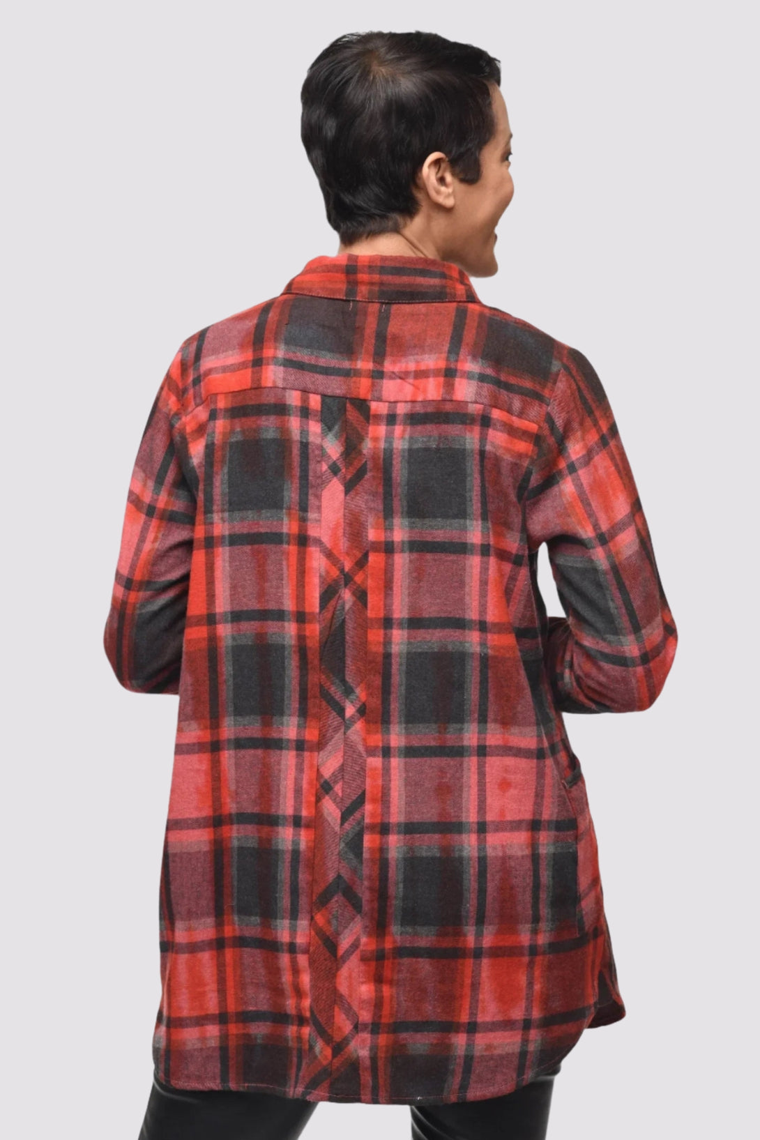 Brenda Pullover by Tulip is a fabulous plaid shirt with a collared deep V-neck and button placket.